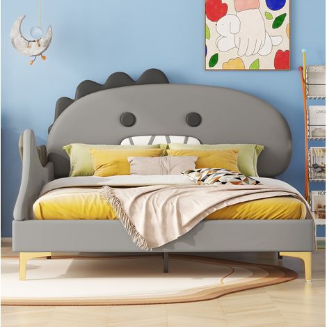 Cama infantil estilo dinosaurio en PU gris 140x200 cm con cabecero decorativo y somier de láminas (1/5)