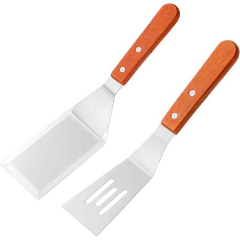 Un ensemble comprend deux spatules en métal : une spatule à barbecue en acier inoxydable avec une cuillère à égoutter et une spatule à frire en métal, parfaite pour griller et cuisiner. (1/5)