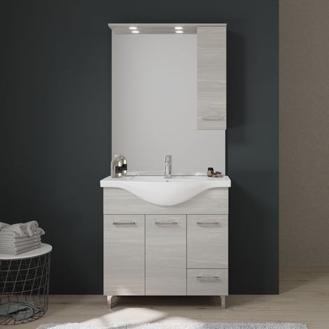 Kiamami Valentina – Meuble de salle de bains 85 cm – Lavabo céramique central – 3 portes et 1 tiroir – Finition chêne gris avec pieds chromés (1/5)