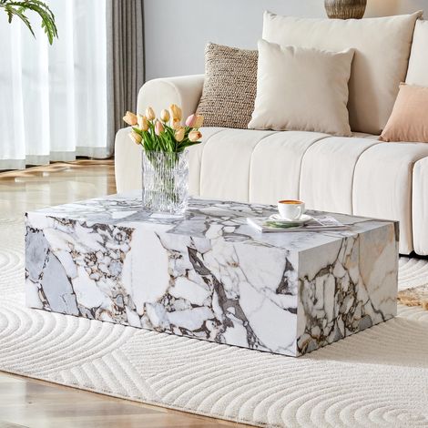 Table basse rectangulaire blanche à l'aspect marbré. Dimensions : 90 × 50 × 30 cm. Matériau : MDF. Livrée montée. Convient aux intérieurs modernes et luxueux, de style scandinave et nord-européen.