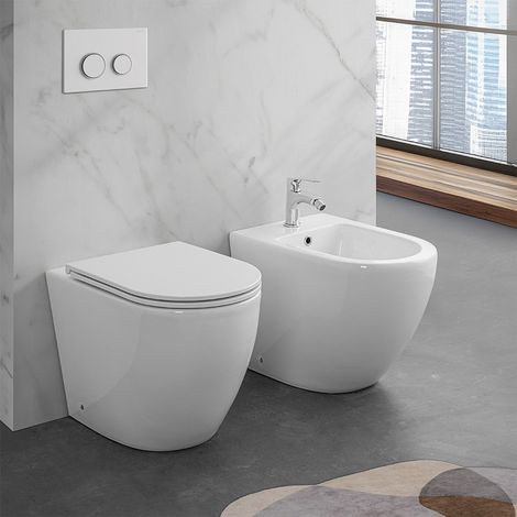 Wc e bidet filomuro per anziani con scarico traslato serie Comoda (1/5)