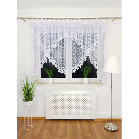Una cortina de dos capas decorada con encaje guipur, hecha de marquesina. (1/5)