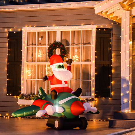 Papá Noel inflable en avión de 160 cm con luces LED integradas, decoración navideña para exteriores.