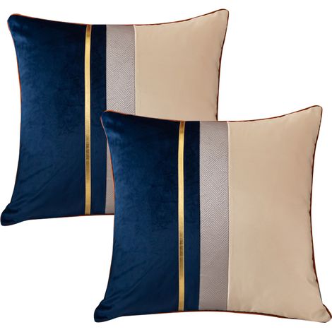 Housse de coussin patchwork bleu marine avec taie d'oreiller à rayures dorées, style moderne et luxueux (1/5)