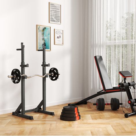 Lot de 4 disques de musculation 2 x 7,5 kg et 2 x 5 kg noirs (1/5)
