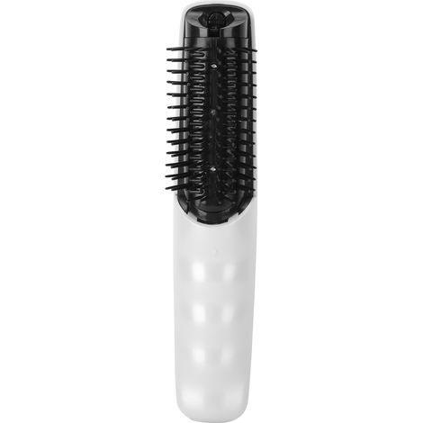 Brosse de massage électrique pour le cuir chevelu, favorisant la chute et la repousse des cheveux.