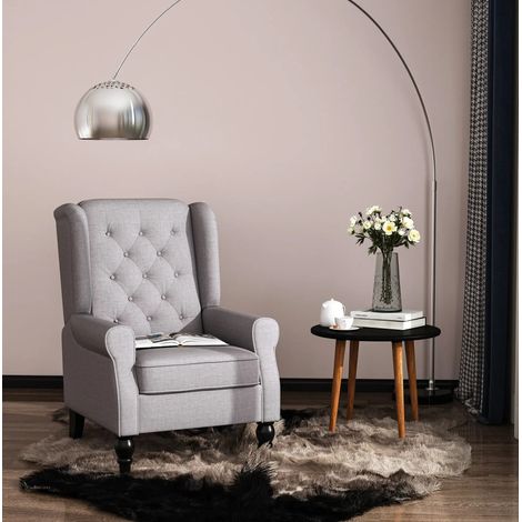 Sillón orejero de poliéster gris 74x86x102 cm con capitoné y patas de madera (1/5)