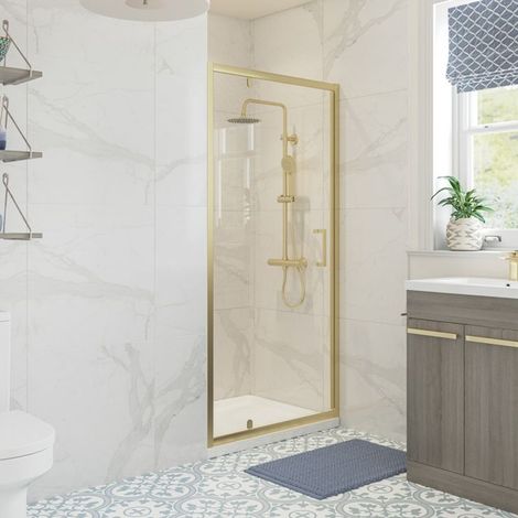Signature Verve Brushed Brass Pivot Shower Door 700mm Wide - 6mm Glass (1/5)