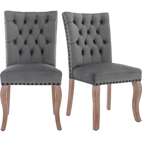 Pack de 2 sillas de comedor tapizadas en terciopelo gris con tachuelas y patas de madera (1/5)