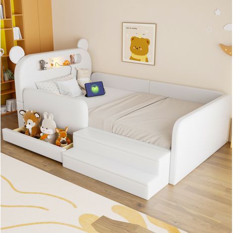 Cama infantil de 90x200 cm con puerto USB, luz nocturna y espacio de almacenamiento, cabecero con forma de osito de peluche y tapicería de polipiel blanca. (1/5)