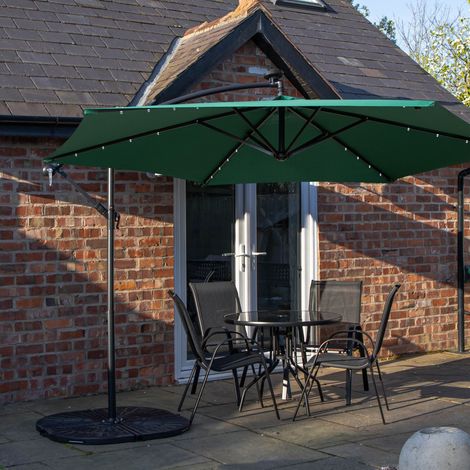 Outdoor 4 Person Round Glass Top Garden Dining Table Chairs With Green Banana Lit Parasol and Base (1/5)