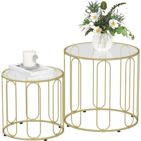 Tables gigognes à découpes elliptiques au fini ton or élégant. Design moderne et épuré pour sublimer votre décoration intérieure