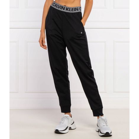 Pantaloni della tuta neri da donna Calvin Klein con coulisse logo, taglia XS. Grazie. (1/2)
