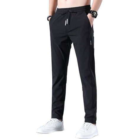 Pantalon de sport pour homme à séchage rapide et extensible, respirant et idéal pour la course à pied et le jogging. Cordon de serrage et poches inclus. Taille L, noir. (1/5)