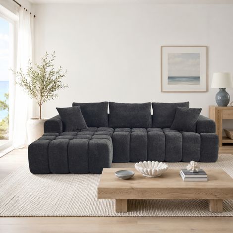 Sofá en forma de L comprimido color gris‑negro, dimensiones: 249,94 x 124,97 x 59,94 cm, incluye 2 cojines decorativos y 3 cojines de respaldo (1/5)