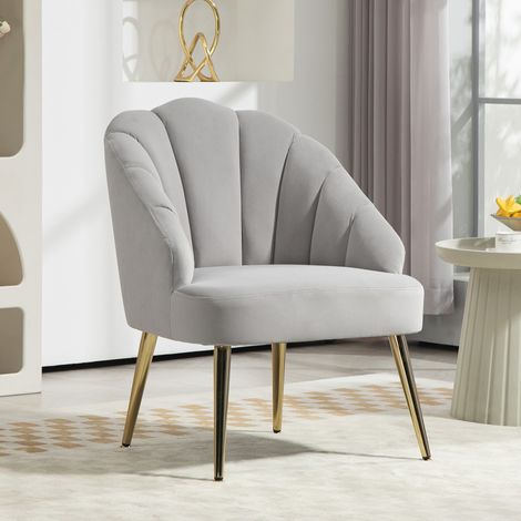 Fauteuil capitonné à dossier coquillage. Fauteuil en velours avec pieds dorés. Pour chambres et salons. Gris.
