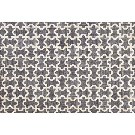 Alfombra jacquard gris y beige de piel de vacuno puzzle patrón geométrico 140 x 200 cm retro
