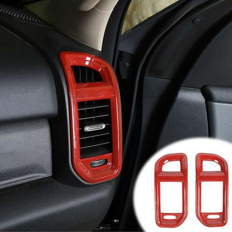 Two decorative trim pieces for the side air vents of the center console for 18-21 Dodge Ram models. (1/4)