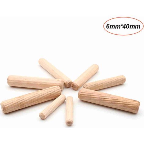 Paquete de 100 tacos de madera estriados para muebles y armarios. (1/5)