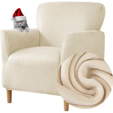 Housse de fauteuil élégante et élastique pour fauteuils club avec accoudoirs, confectionnée en tissu beige doux. (1/5)