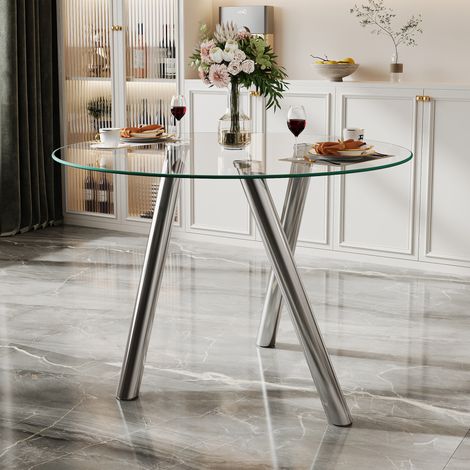 Table à manger ronde en verre trempé et métal argenté, plateau transparent (1/5)