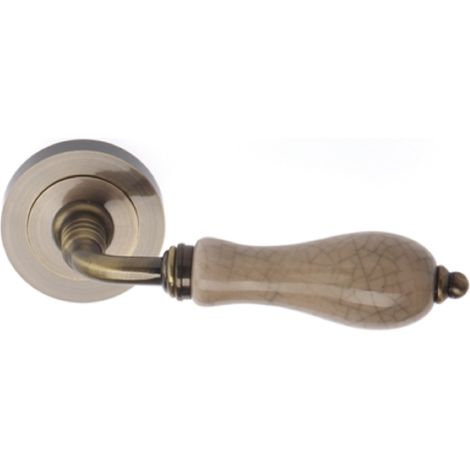 Manilla puerta aluminio roseta redonda cuero porcelana 52mm (1/5)