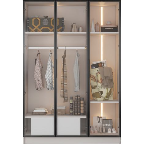 Armoire blanche et spacieuse, dotée de 3 portes en verre, d’une compartimentation et d’un support pour vêtements. Dimensions : 110×50×160 cm. L’armoire est équipée d’un éclairage LED.