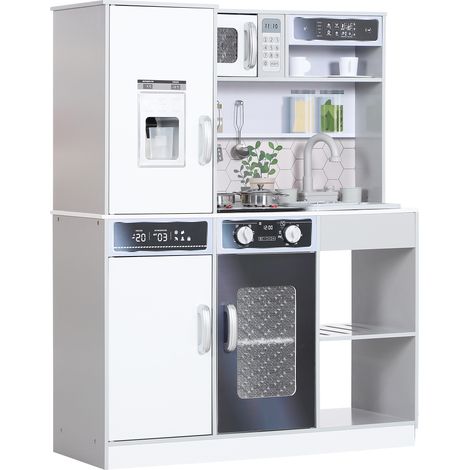 Cuisine en bois pour enfants avec une cuisinière lumineuse et sonore, un évier avec système de circulation d'eau et accessoires, blanche.