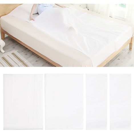 Lot de 4 housses de couette jetables sous vide WHIKON en tissu non tissé, comprenant draps, taies d'oreiller et sacs de rangement. Fournitures hôtelières. (1/5)