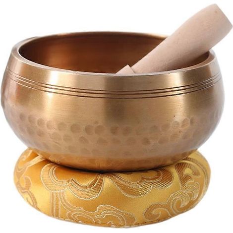 Handgefertigte tibetische Klangschale aus Messing für Meditation und Yoga in Nepal. Diese vom tibetischen Buddha inspirierte Klangschale eignet sich ideal für die Musiktherapie. (1/5)