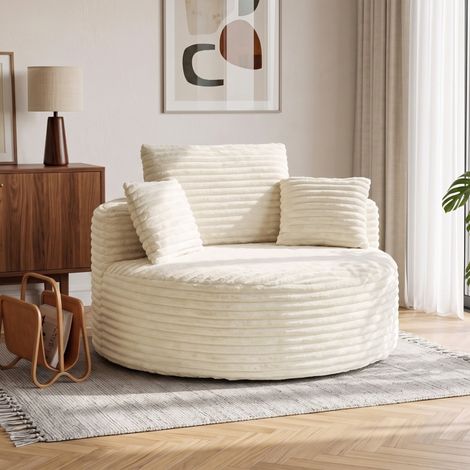 Poltrona con seduta profonda, divano singolo senza struttura fissa, imbottitura in schiuma, 4 cuscini, colore bianco crema. (1/5)