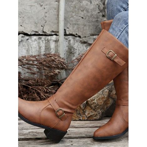 Bottes cavalières pour femmes, à la fois tendance et confortables, montantes, avec talons compensés, fermeture éclair latérale et bout pointu, parfaites avec un jean. (1/3)