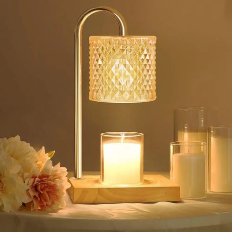 Une lampe à cire avec minuterie et variateur est un cadeau parfait pour les femmes, ajoutant une touche d'élégance à n'importe quelle maison. (1/5)