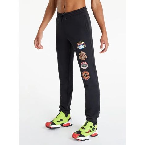 Pantaloni della tuta da uomo Reebok neri stampati XL SFONDI SELEZIONATI (1/5)