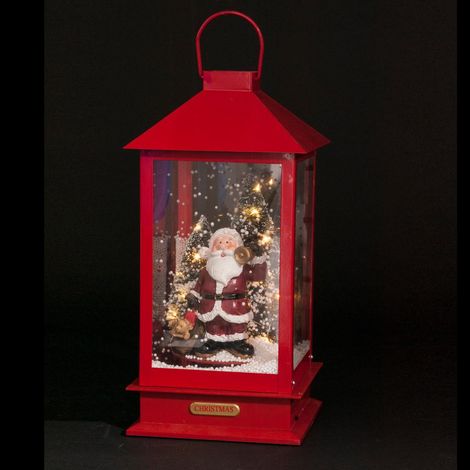 Fééric Lights And Christmas – Lanterne animée et musicale de Noël H 38 cm – Résine plastique – 18 LED blanc chaud – Pour intérieur – Effet neige (1/2)