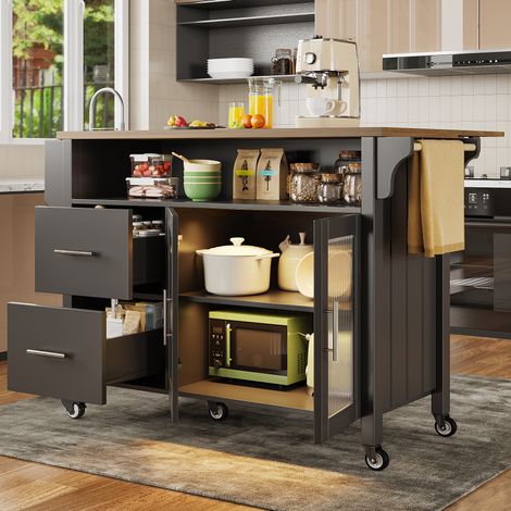 Îlot de cuisine 139x40x94 cm noir en MDF avec plateau rabattable, LED, roulettes et rangement (1/5)