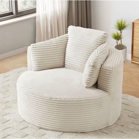 Poltrona rotonda beige in velluto a coste con schienale imbottito e comfort ergonomico (1/5)