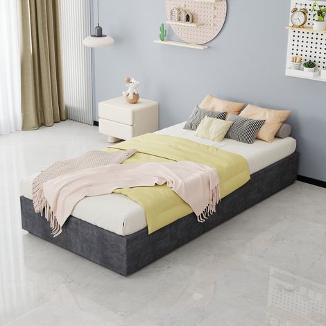 Lit moderne 90x200 cm gris en tissu et métal, structure robuste, sans tête de lit (1/5)
