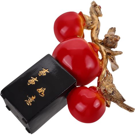 Petite figurine chinoise en résine représentant un oiseau et