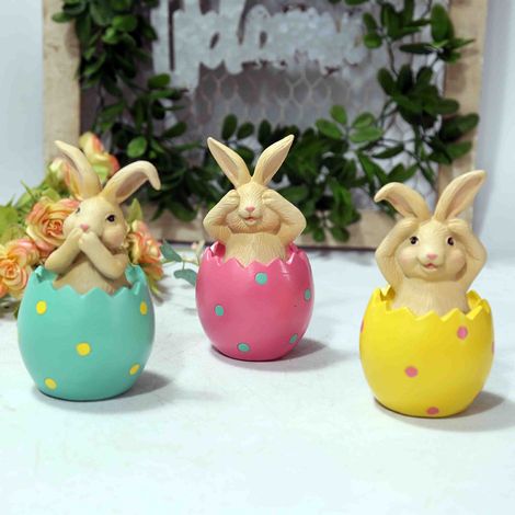 Décoration de Pâques pour la maison : adorable lapin en résine assis sur une coquille d’œuf, à poser sur un bureau. (Ne tenez pas compte de l’image du lapin assis sur une coquille d’œuf rose.) (1/5)