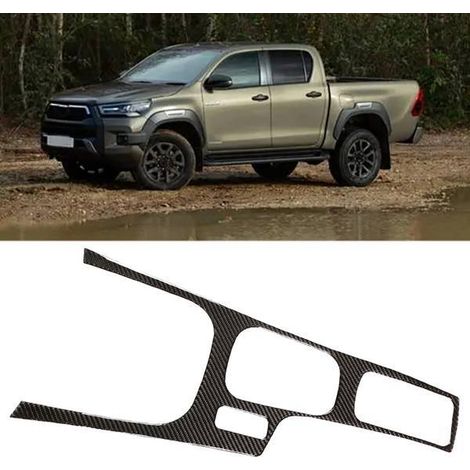 OC07635 is a soft carbon fiber center console/gear panel decal suitable for 2015-2021 Toyota Hilux models. (1/4)