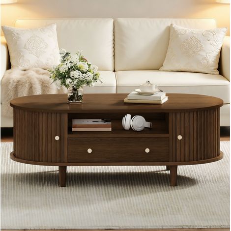 DESMIU Table basse ovale avec 1 tiroir, niche ouverte et porte coulissante, 4 pieds, MDF, noyer, 100 × 50 × 36 cm (1/5)