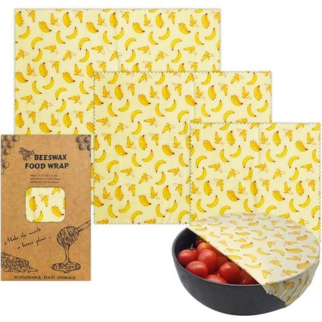 Set di 3 involucri in cera d'api con motivo a banana, disponibili in tre diverse misure, riutilizzabili e privi di plastica, ideali per frutta, pane e altri alimenti. (1/2)