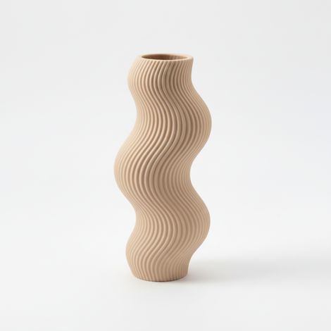 Vaso decorativo a forma di onda, color beige, dal design minimalista.