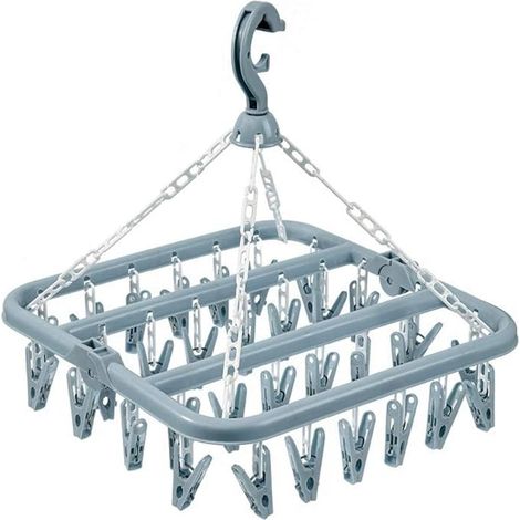 Étendoir à linge avec 32 pinces et porte-chaussettes pliable. (1/5)