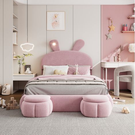 Letto imbottito 140x200 cm in velluto rosa, design con orecchie di coniglio, rete a doghe, contenitore idraulico e 2 pouf (1/5)
