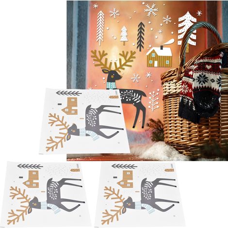 Set aus 3 individuell gestaltbaren statischen Wandaufklebern aus PVC mit Rentier- und Schneeflockenmotiv für eine minimalistische und kreative Wohnzimmerdekoration. (1/5)