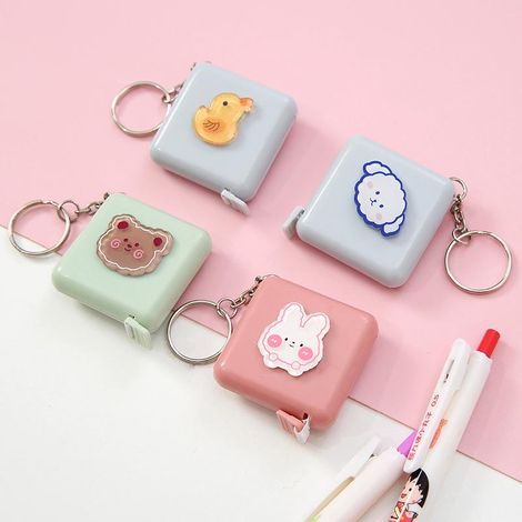 Lot de 4 mètres ruban adhésif mignons dessin animé (caneton jaune, ours brun, lapin blanc, chiot), double décimètre souple extensible pour couture, tailleur, 150 cm, outil de mesure corporelle rétract (1/5)