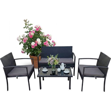Conjunto de muebles de jardín de ratán de 4 piezas con cojines.