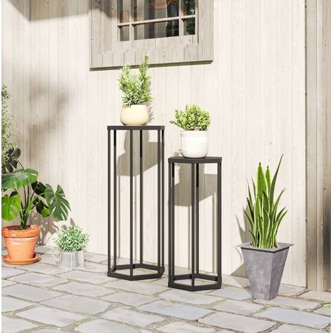 Set de 2 soportes para plantas 31x27x75 cm y 28x25x60 cm negro de metal con diseño hexagonal (1/3)